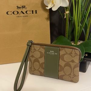 Signature coach wristlet